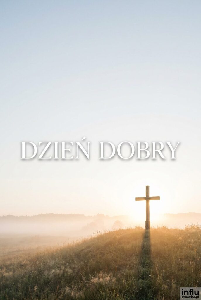 Krajobraz o wschodzie słońca z krzyżem na wzgórzu i napisem „Dzień dobry" na jasnym niebie.