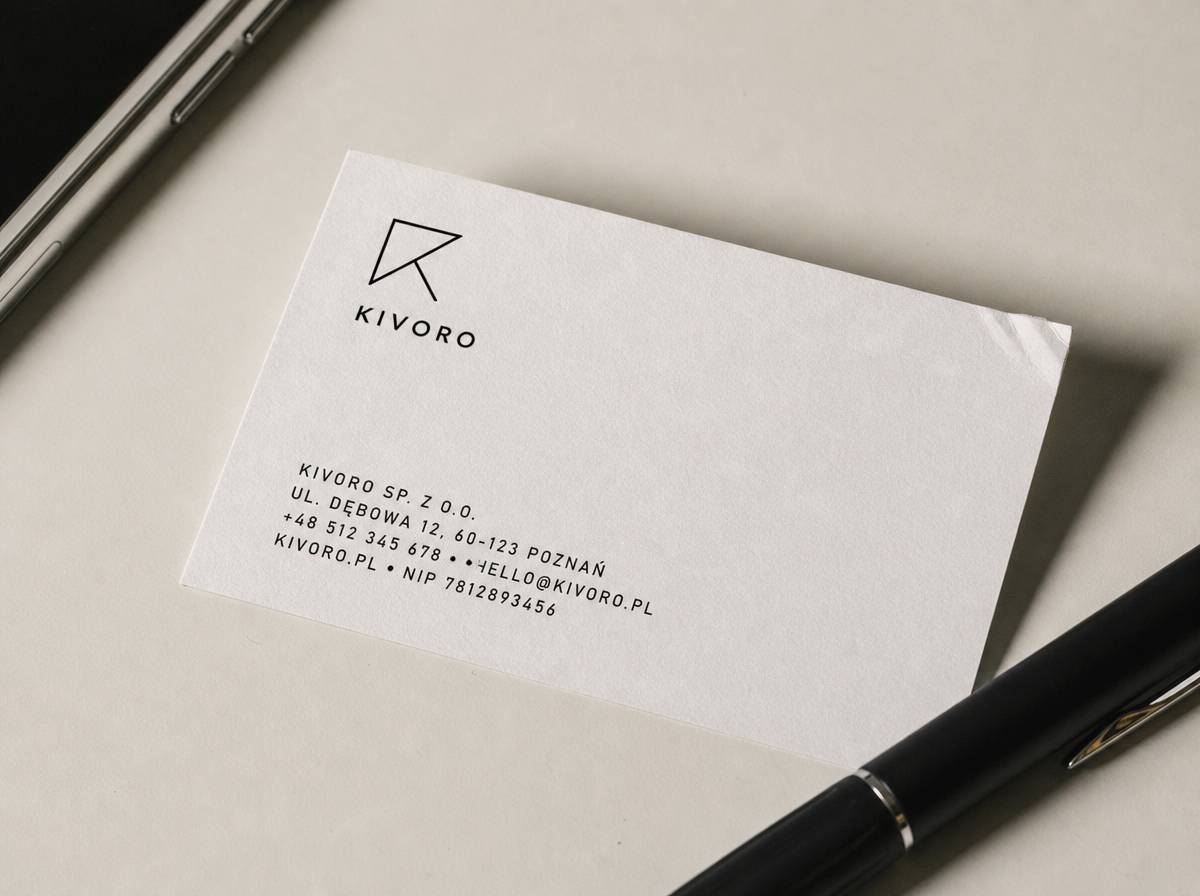 Wizytówka z widocznym układem nazwy firmy, logo i danych kontaktowych